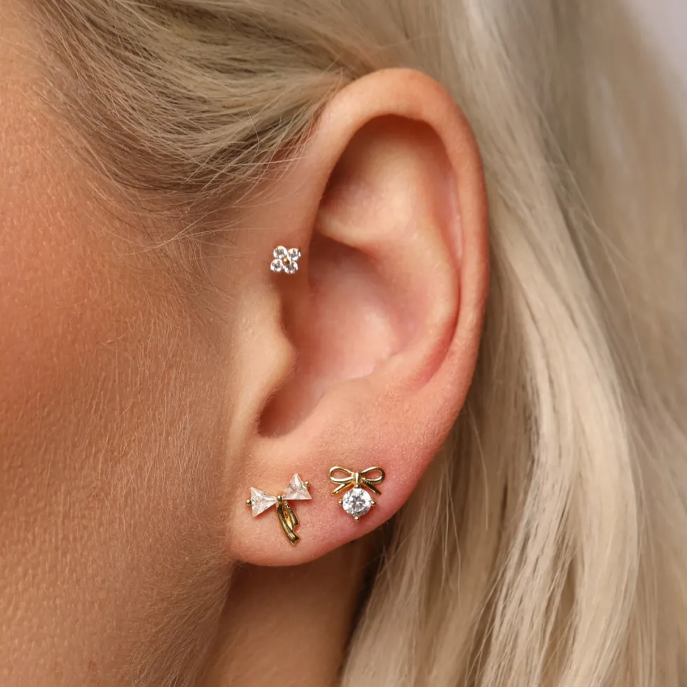 Cute Four Piercing | Titan